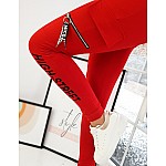 Dámské červené teplákové kalhoty s nápisem vuy0755